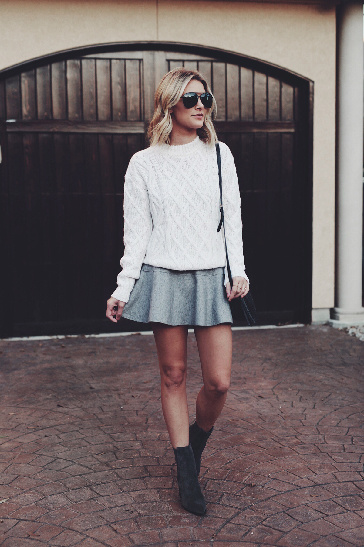 white cable knit sweater outfit