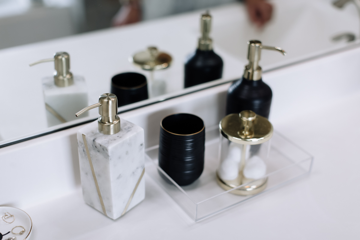 black and gold bathroom accessories for gender neutral master