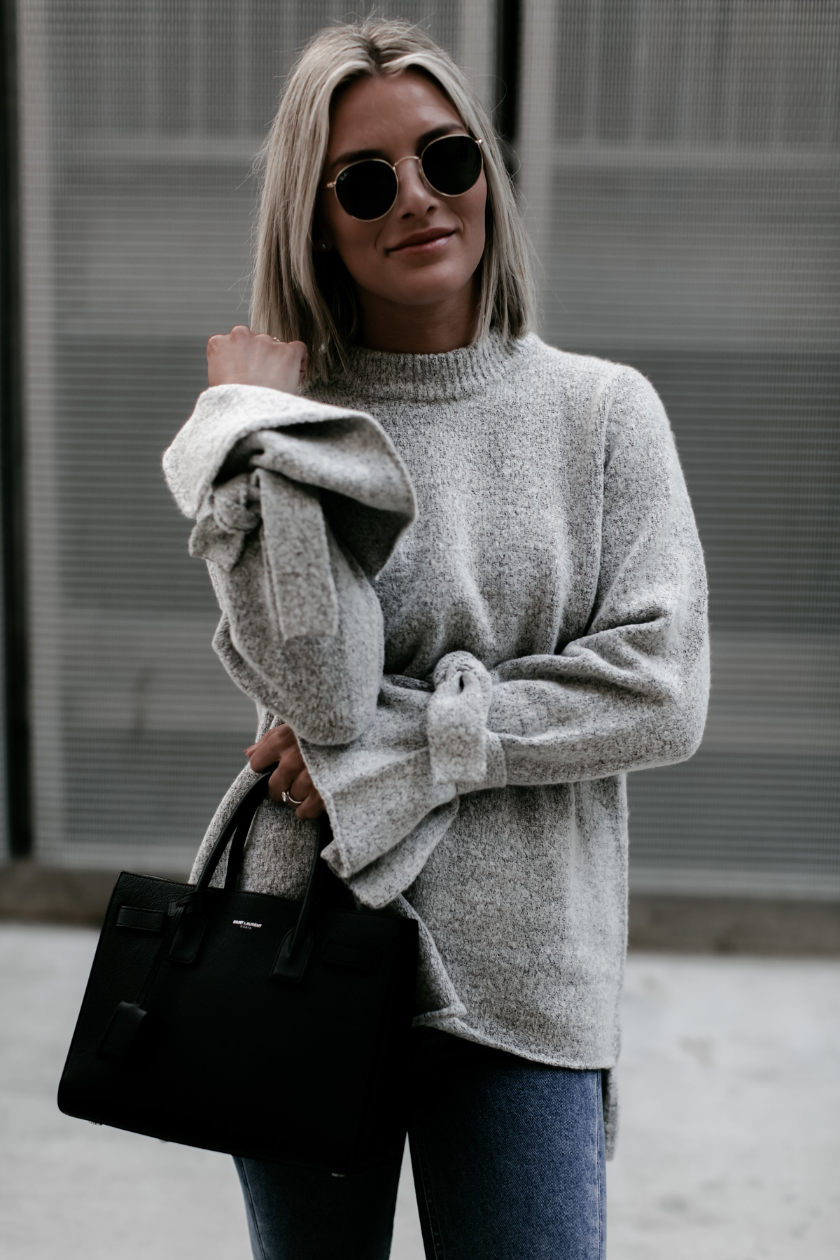 blogger So Sage wearing a grey tie sleeve sweater