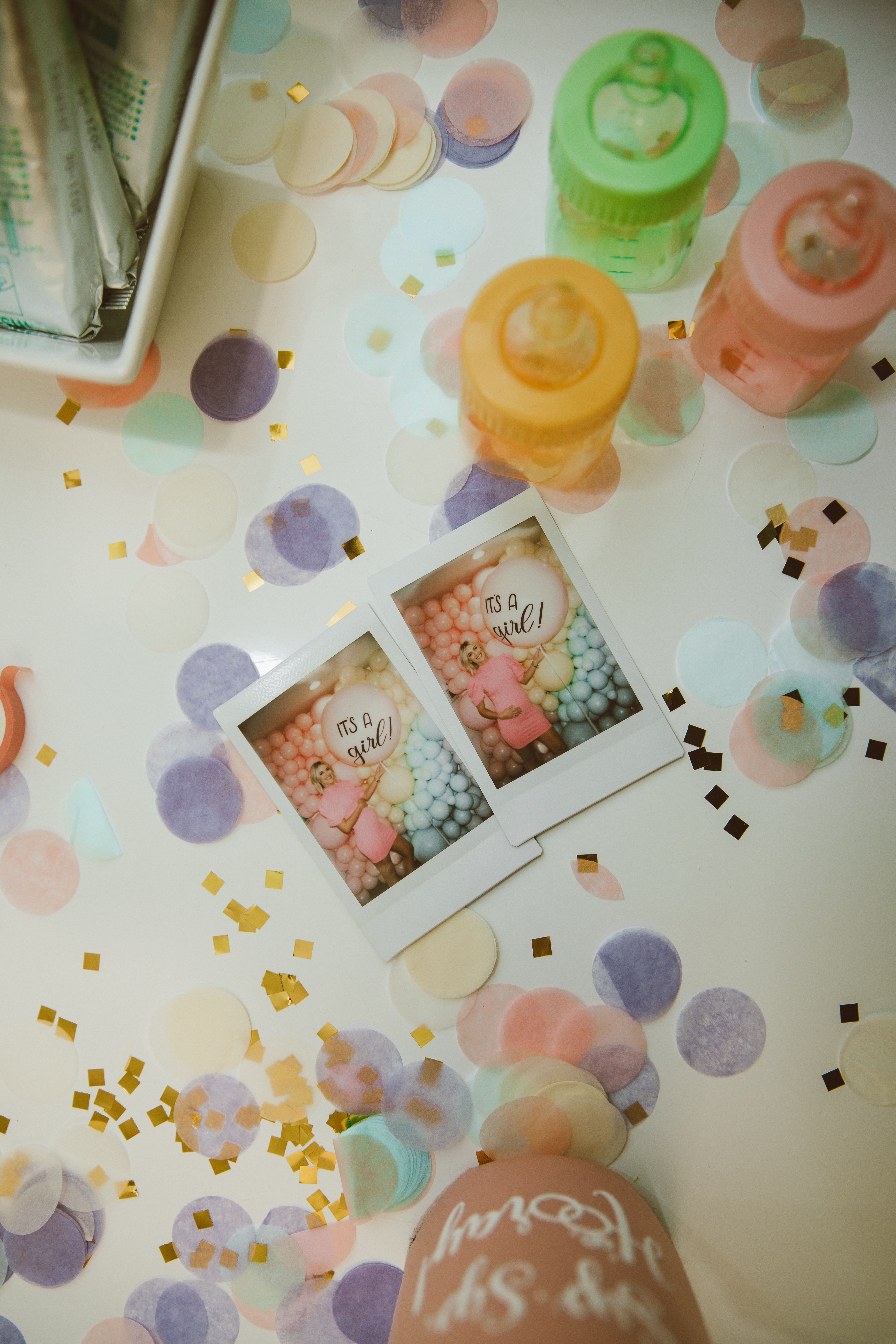 guessing gender for gender reveal with polaroids