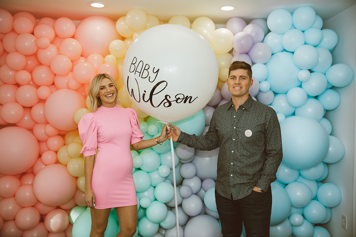 pastel colored balloons for gender reveal party