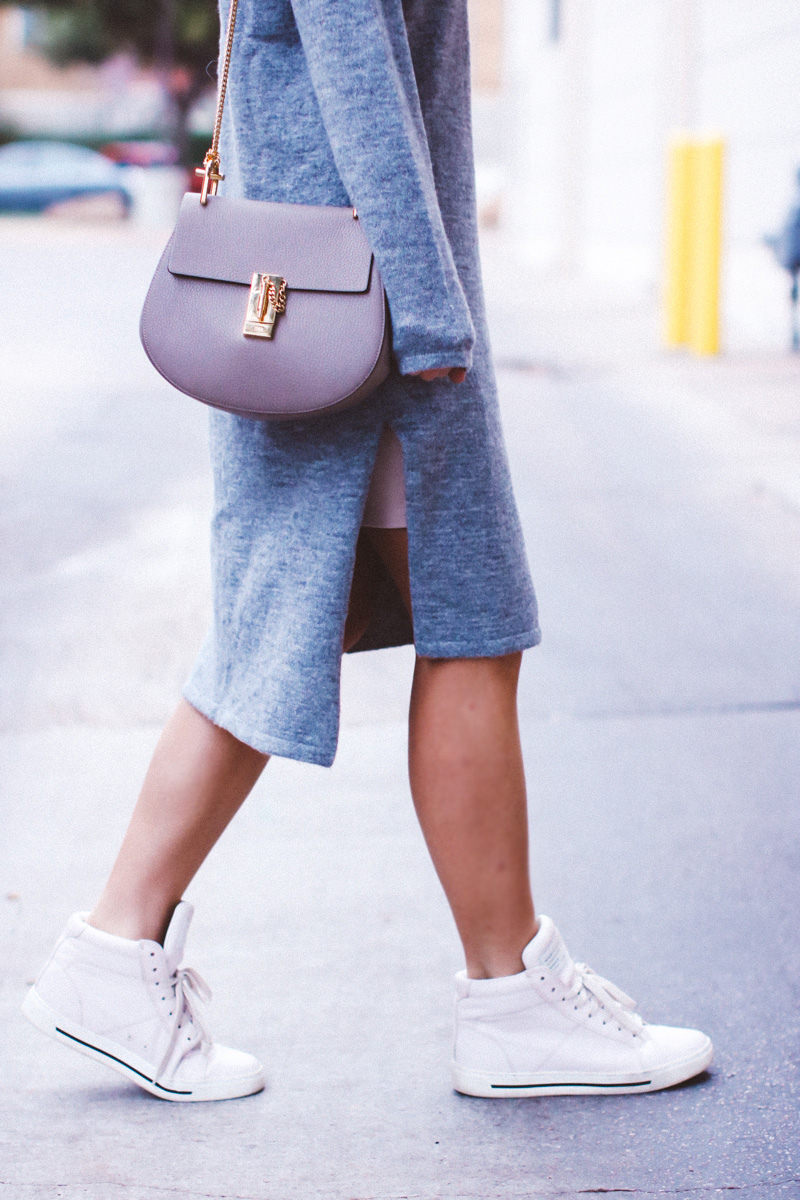 sweater dress and high-top sneakers