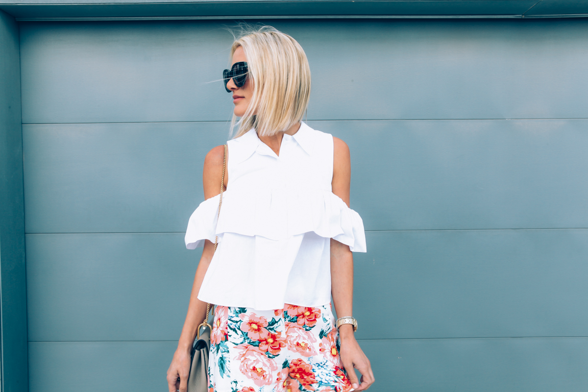 white ruffled cut out shoulder top