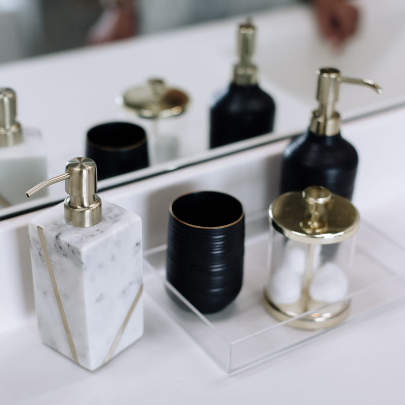 black and gold bathroom accessories for gender neutral master