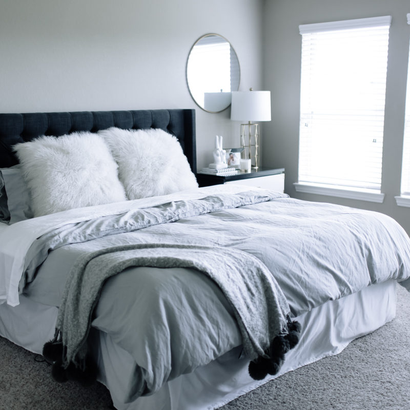 all shades of grey neutral colored master bedroom