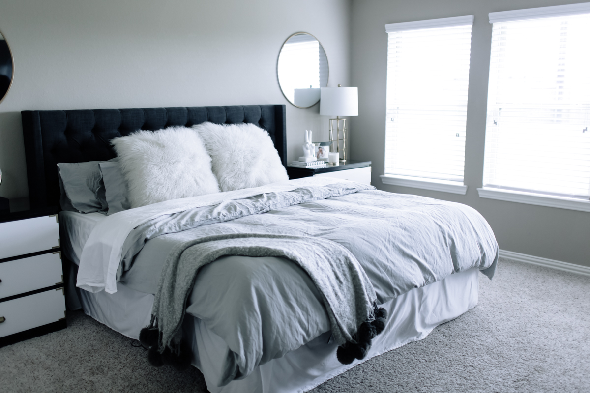 all shades of grey neutral colored master bedroom