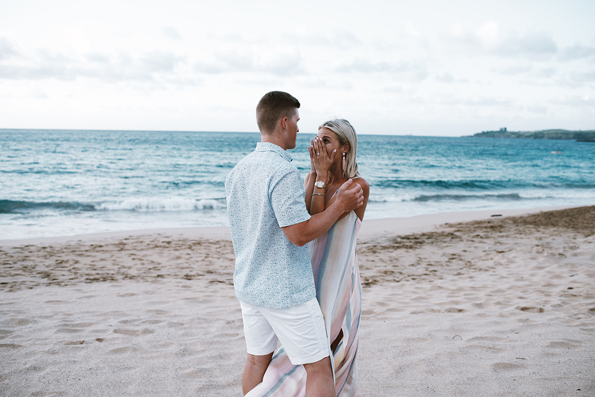 beach proposal engagement in Maui