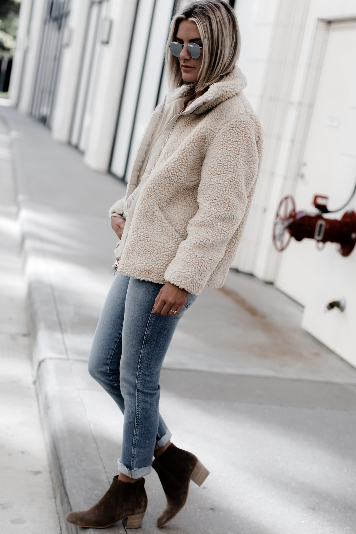 a cream colored pile teddy jacket on blogger So Sage