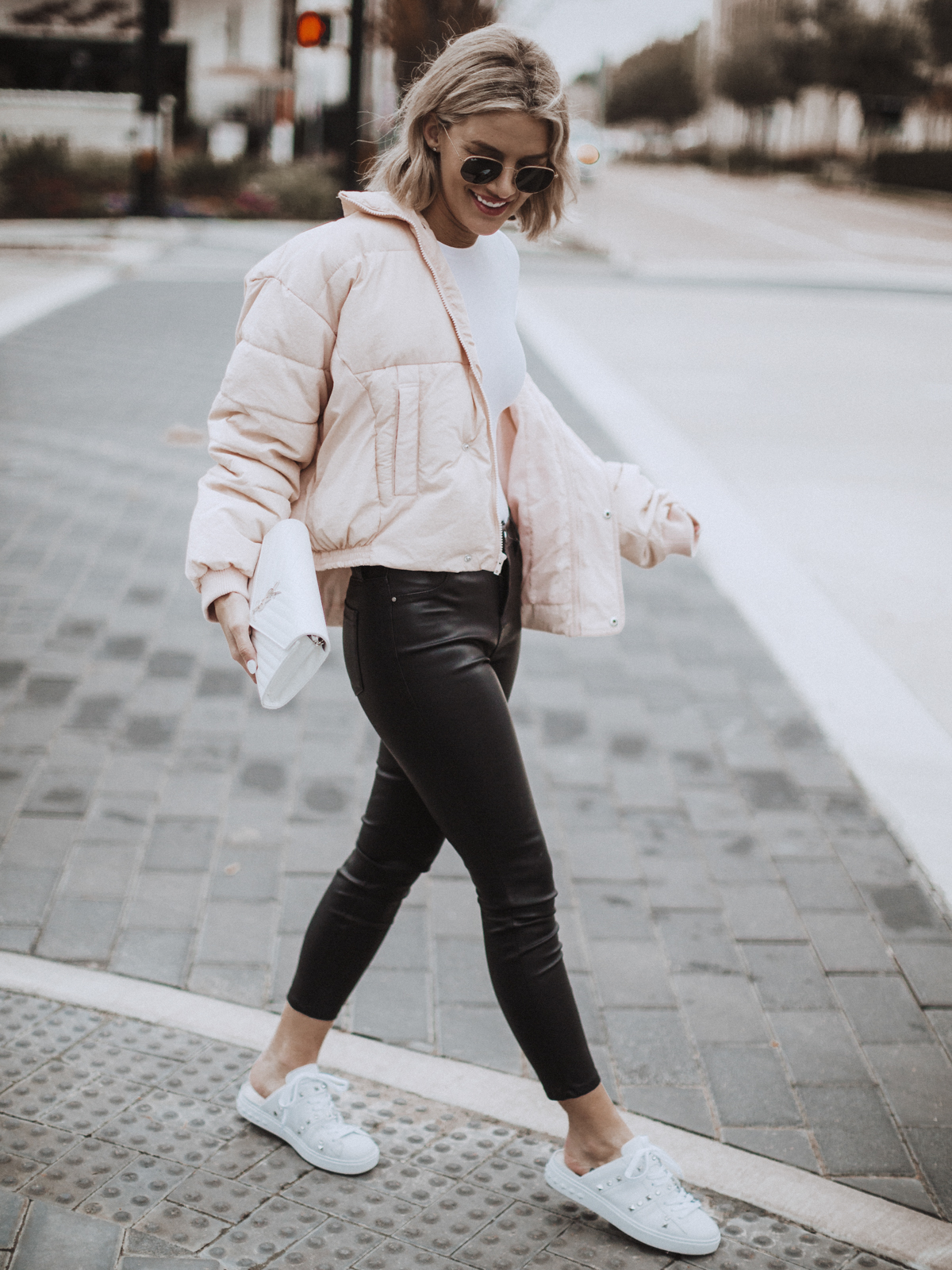 pink puffer coat from Free People on blogger So Sage