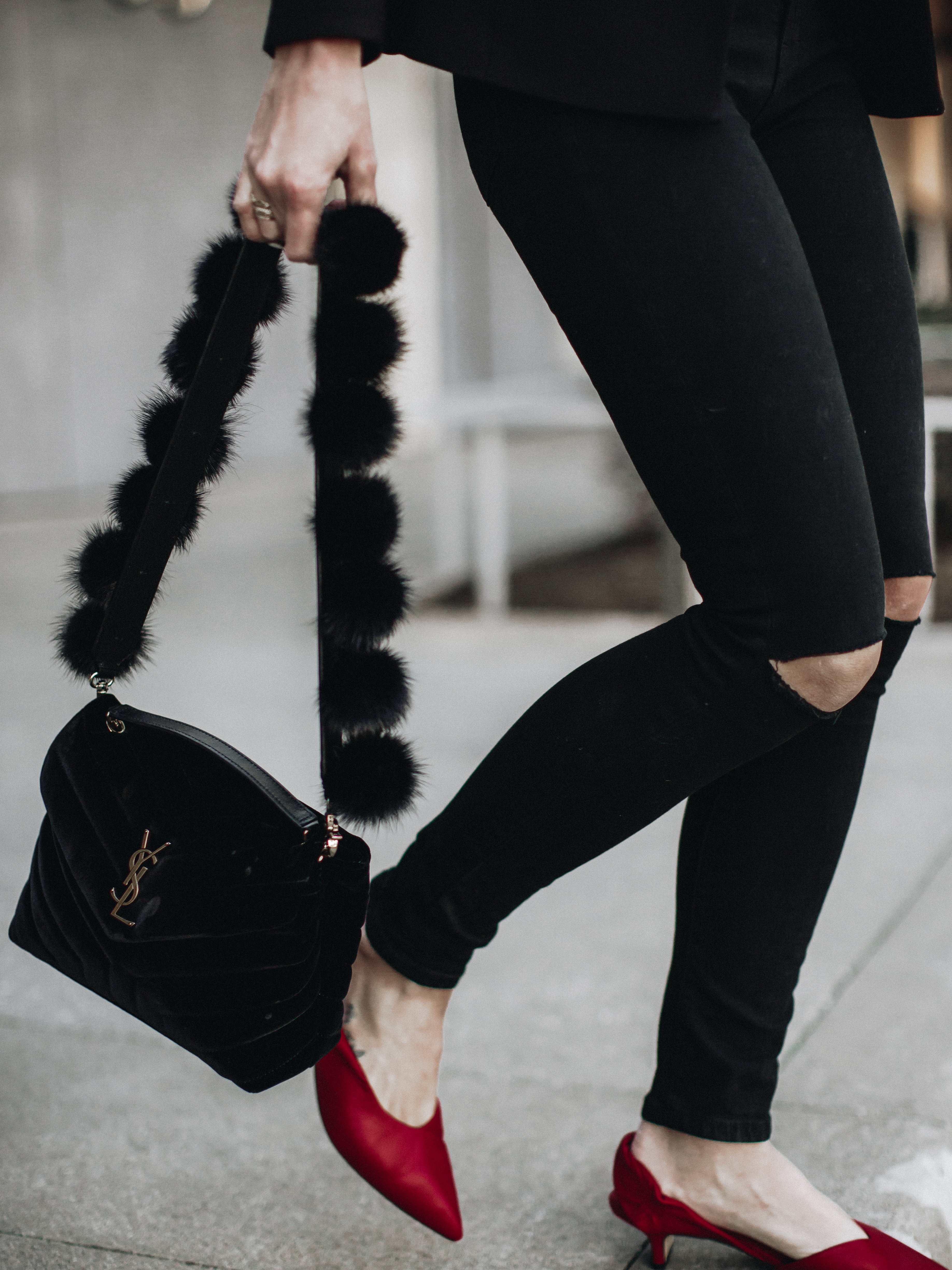 a pop of red on Sage Coralli wearing red Sigerson Morrison slingback