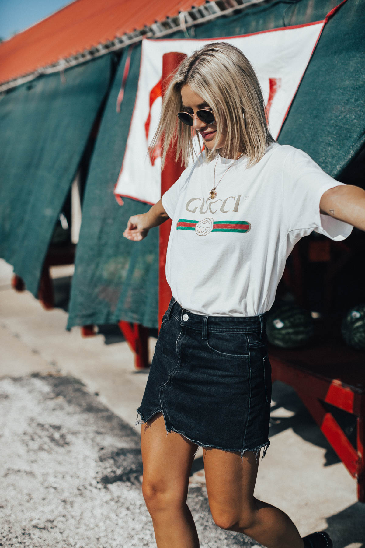 90's inspired look wearing a Gucci logo t-shirt